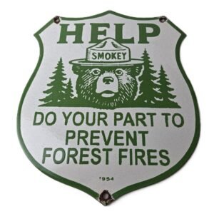 This vintage Forest Service porcelain sign features the iconic Forest Service branding and is made of porcelain. The sign measures 10" across by 12" tall and features Smokey the Bear and says "HELP" in large lettering at the top of this shield sign. Whether you are displaying this sign as part of your collection in your man cave, shop, bar, or garage, or giving it as a gift, you can also browse my other auctions for more vintage gas, oil, aviation, automobile, motorcycle, and hunting signs.