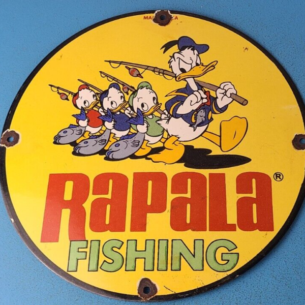 VINTAGE RAPALA FISHING LURES PORCELAIN SALTWATER REELS SALES WALT DISNEY SIGN 305234202813