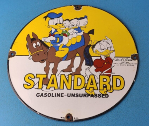 VINTAGE STANDARD GASOLINE PORCELAIN DUCKS WALT DISNEY GAS OIL PUMP PLATE SIGN 305877465963